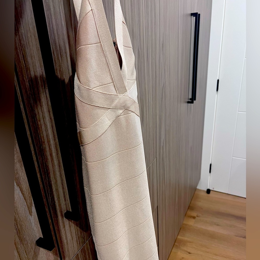 Bebe cream/pearl like dress size small